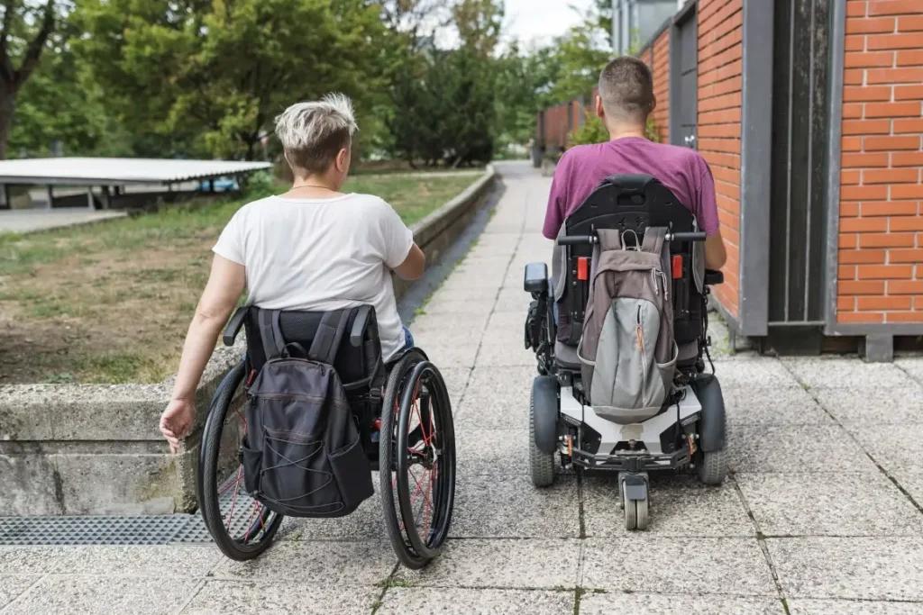 Two friends in wheelchairs