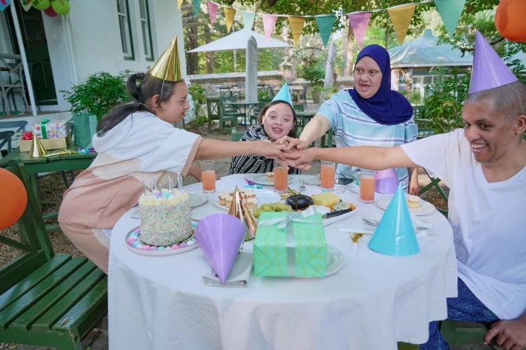 Disabled friends at birthday party