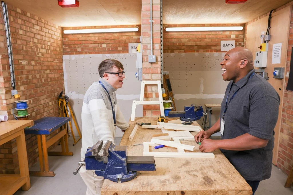 Disabled friends in carpentry class